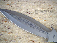 Hand-engraving on "Amethystine" dagger, on blade flat (spine) in 440C high chromium stainless tool steel