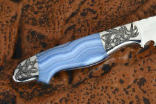 "Perseus" reverse side view in 440C high chromium martensitic stainless steel blade, hand-engraved 304 stainless steel bolsters, blue lace agate gemstone handle, hand-carved, hand-dyed leather sheath