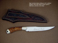 Personal embellishment, name, font, and text etched on hollow ground custom knife blade