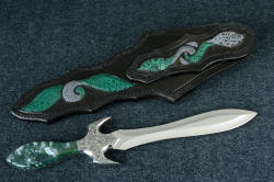 "Achelous" fine handmade custom dagger, reverse side view. Sheath back is compleltely inlaid with bicolored frog skin, all stitching is double row.
