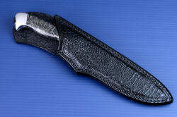"Aldebaran" sheathed view. Sheath is deep and protective, with a high back, and showcases the unique gemstone handle pattern, echoed in the glazed ostrich leg skin texture and pattern