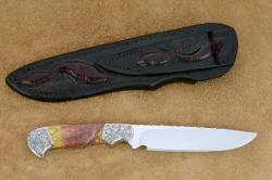 "Aldebaran" reverse side view. Sheath back and belt loop are hand-carved and inlaid with ostrich leg skin