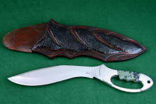 "Ananke" fine custom handmade knife, obverse side view in ATS-34 high molybdenum stainless steel blade, 304 stainless steel bolsters, Kambaba Jasper gemstone handle, hand-carved leather sheath inlaid with buffalo skin