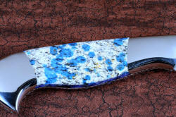 "Andromeda" reverse side gemstone handle detail view in T3 deep cryogenically treated CPM 154CM powder metal technology high molybdenum stainless steel blade, 304 stainless steel bolsters, K2 Azurite Granite gemstone handle, hand-carved leather sheath inlaid with blue rayskin