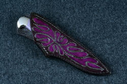 "Andromeda" sheathed view in T3 deep cryogenically treated CPM 154CM powder metal technology high molybdenum stainless steel blade, 304 stainless steel bolsters, Purple Turkish Jade gemstone handle, hand-carved, hand-dyed leather sheath