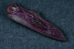 "Andromeda" sheath back detail in T3 deep cryogenically treated CPM 154CM powder metal technology high molybdenum stainless steel blade, 304 stainless steel bolsters, Purple Turkish Jade gemstone handle, hand-carved, hand-dyed leather sheath
