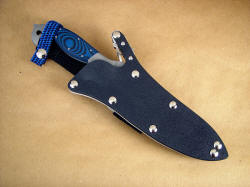 "Anzu" sheathed view with sheath extender. Extender allows a lower carry at the waist, and the shock cord does not allow the knife handle to flop around while active.
