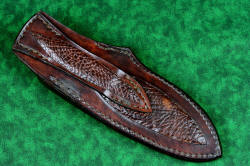 "Arcas" fine custom handmade knife, sheath back detail. Belt loop and sheath back are both inlaid with bison skin