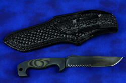 "Arctica" professional tactical, combat, rescue, counterterrorism knife, reverse side view, leather sheath. Sheath is tooled front and back, and belt loop