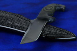 "Arctica" professional tactical, combat, rescue, counterterrorism knife, knife blade point detail. The Tanto point is incredibly strong, due to width, complex grinds, and with a top swage has great penetrating geometry
