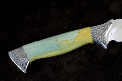 "Argyre" reverse side handle detail. Gemstone handle is bedded to frame of full tang knife blade, front bolsters are sculpted to grind termination