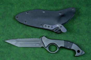"Ari B'Lilah" Counterterrorism Tactical Knife, Obverse side view  in T3 cryogenically treated CPM 154CM powder metal technology high molybdenum martensitic stainless steel blade, 304 stainless steel bolsters, Black G10 fiberglass/epoxy composite handle, hybrid tension tab-locking sheath in kydex, anodized aluminum, stainless steel, titanium