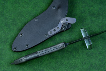 "Ari B'Lilah" Counterterrorism Tactical Knife, spine detail  in T3 cryogenically treated CPM 154CM powder metal technology high molybdenum martensitic stainless steel blade, 304 stainless steel bolsters, Black G10 fiberglass/epoxy composite handle, hybrid tension tab-locking sheath in kydex, anodized aluminum, stainless steel, titanium