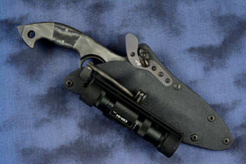 "Ari B'Lilah" Counterterrorism Tactical Knife, sheathed view with HULA flashlight accessory in T3 cryogenically treated CPM 154CM powder metal technology high molybdenum martensitic stainless steel blade, 304 stainless steel bolsters, Black/Gray G10 fiberglass/epoxy composite handle, hybrid tension tab-locking sheath in kydex, anodized aluminum, stainless steel, titanium