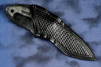 "Ari B'Lilah" Counterterrorism Tactical Knife, leather sheathed view in T3 cryogenically treated CPM 154CM powder metal technology high molybdenum martensitic stainless steel blade, 304 stainless steel bolsters, Black/Gray G10 fiberglass/epoxy composite handle, hybrid tension tab-locking sheath in kydex, anodized aluminum, stainless steel, titanium
