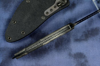 "Ari B'Lilah" Counterterrorism Tactical Knife, Spine edgework, filework view in T3 cryogenically treated CPM 154CM powder metal technology high molybdenum martensitic stainless steel blade, 304 stainless steel bolsters, Black/Gray G10 fiberglass/epoxy composite handle, hybrid tension tab-locking sheath in kydex, anodized aluminum, stainless steel, titanium
