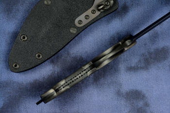 "Ari B'Lilah" Counterterrorism Tactical Knife, inside handle tang view in T3 cryogenically treated CPM 154CM powder metal technology high molybdenum martensitic stainless steel blade, 304 stainless steel bolsters, Black/Gray G10 fiberglass/epoxy composite handle, hybrid tension tab-locking sheath in kydex, anodized aluminum, stainless steel, titanium
