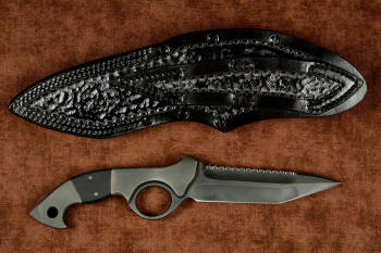 "Ari B'Lilah" Counterterrorism Tactical Knife, reverse side view with leather sheath back in T3 cryogenically treated CPM 154CM powder metal technology high molybdenum martensitic stainless steel blade, 304 stainless steel bolsters, Black G10 fiberglass/epoxy composite handle, hybrid tension tab-locking sheath in kydex, anodized aluminum, stainless steel, titanium