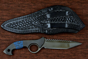 "Ari B'Lilah" counterterrorism, tactical, combat knife, reverse side view in T4 cryogenically treated 440C high chromium martensitic stainless steel blade, 304 stainless steel bolsters, blue/black tortoiseshell G10, black micarta  handle, post-lock leather sheath in 9-10 oz. shoulder, double row nylon stitching, black oxide stainless steel snaps and reinforcement hardware