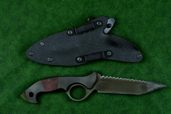 "Ari B'Lilah" counterterrorism, tactical, combat knife, reverse side view in T4 cryogenically treated 440C high chromium martensitic stainless steel blade, 304 stainless steel bolsters, red/black  G10 handle, hybrid tension tab locking sheath in kydex, anodized aluminum, anodized titanium, black oxide stainless steel