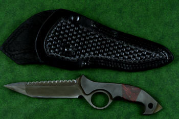 "Ari B'Lilah" counterterrorism, tactical, combat knife, obverse side view in T4 cryogenically treated 440C high chromium martensitic stainless steel blade, 304 stainless steel bolsters, red/black  G10 handle, 9-10 oz. leather shoulder sheath with nylon double row stitching, black oxide stainless steel snaps and reinforcement