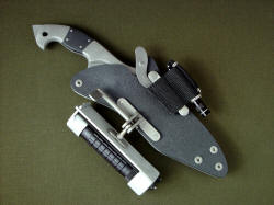 "Ari" sheathed view. Sheath accessories can be located in many different position and orientations around sheath. 