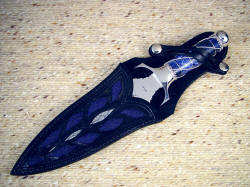 "Amethystine" sheathed view. Sheath is complimentary, and displays knife well. 