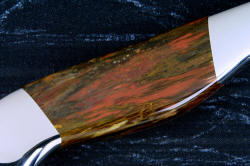 "Thresher" fine handmade chef's knife, BBQ knife, fillet knife, reverse side 4.4 power magnification of gemstone handle  view in T3 cyrogenically treated 440C high chromium stainless steel blades, 304 stainless steel bolsters, Caprock petrified wood gemstone handles, Bison (American Buffalo), leather shoulder book case