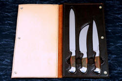 "Bordeaux, Courbe Vaste, Thresher" fine handmade chef's knives, BBQ knives, book case inside view in Bison (American Buffalo), leather shoulder, nylon stitching, stainless steel snap fasteners book case
