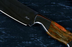 "Courbe Vaste" fine handmade chef's knives, BBQ knives, maker's mark detail  in T3 cyrogenically treated 440C high chromium stainless steel blades, 304 stainless steel bolsters, Caprock petrified wood gemstone handles, Bison (American Buffalo), leather shoulder book case