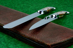 "Bordeaux and Rebanador" Fine Handmade Professional Grade Chef's Knives/BBQ Knives, knife blade cutting edge, point detail in T3 Cryogenic Treated 440C high chromium stainless steel blades, 304 stainless steel bolsters, Brown Zebra Jasper gemstone handles, leather book case covered in Bison (American Buffalo) skin