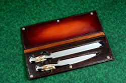 "Bordeaux and Rebanador" fine chef's knives, BBQ knives, book case inside view in Bison (American Buffalo) skin, heavy leather shoulder, nylon stitching, stainless steel hardware