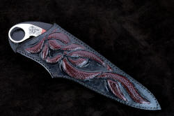 "Bulldog" sheathed view. Sheath is deep and protective of the knife and wearer, the pattern and design flows from the bolster engraving to the sheath body, front and back