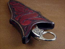 "Bulldog" fine handmade knife, sheath throat view. Sheath is thick and strong, knife is easily available with the finger ring extended. Note the tight stitching through the thick welts.