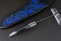 "Carina" fielwork, edgework detail. bolsters are dovetailed to lock handle scales to tang, tang is tapered for balance.