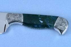 Obverse side gemstone handle detail of "Segin" (Cassiopeia chef's set) Utility  knife in T3 cryogenically treated 440C high chromium stainless steel blade, hand-engraved 304 stainless steel bolsters, Indian Green Moss Agate gemstone handle
