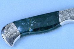 4x enlargement of reverse side gemstone handle of "Segin" (Cassiopeia chef's set) Utility  knife in T3 cryogenically treated 440C high chromium stainless steel blade, hand-engraved 304 stainless steel bolsters, Indian Green Moss Agate gemstone handle