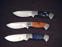 Three "Chama" investment, hunting knives in 440C stainless steel blades, hand-engraved low carbon steel bolsters, Sodalite, Copper Ore, Snowflake Obsidian gemstone handles