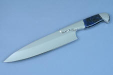 "Concordia" Master Chef's Custom Knife. obverse side view, blade forward, in 440C deep cryogenically treated high chromium stainless steel blade, 304 stainless steel bolsters, Sodalite gemstone handle