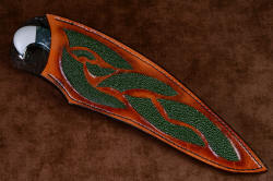 "Conodont" custom knife, sheath front view. Sheath has graduated tonality with hand-dying in browns to tans, with large inlays of green rayskin