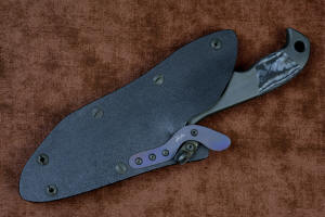 "Contego" Counterterrorism Tactical Knife, sheathed view, in T3 cryogenically treated CPM154CM  powder metal technology high molybdenum martensitic stainless steel blade, 304 stainless steel bolsters, Black/Gray G10 fiberglass/epoxy composite handle, hybrid tension tab-locking sheath in kydex, anodized aluminum, stainless steel, titanium