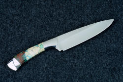 Knife handle butt is wide and counterweight for blade of "Cygnus" Custom handmade chef's knife in T3 cryogenically treated 440C high chromium stainless steel blade, 304 stainless steel bolsters, Cuprite mosaic gemstone handle, hand-tooled leather sheath