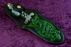"Darach" sheathed view. Sheath matches knife design artwork, is fully stitched with polyester for durability, sealed with lacquer