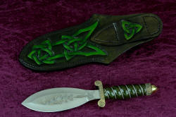 "Darach" Celtic dagger, reverse side view. Sheath back and belt loop are hand-carved, hand-dyed leather shoulder
