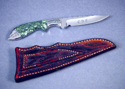 "Durango" reverse side view. Note custom etching on stainless steel blade, full hand-carving on sheath back and belt loop