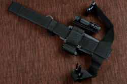 "Galatea" professional tactical, combat, rescue, CSAR, counterterrorism knife, EXBLX back side view. Long runs of webbing in EXBLX are stiffened with acrylic plates stitched inside webbing. Lower leg strap location is shown for 2" leg strap