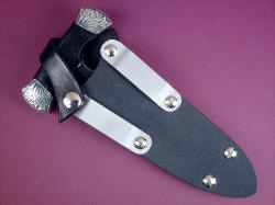 "Grim Reaper" tactical sheath detail. The die-formed aluminum belt loop can be moved from front to back, and from high to low position on sheath frame