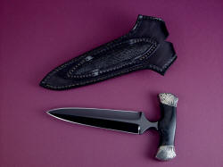"Grim Reaper" reverse side view. Note panel inlay of stingray skin on sheath belt loop, thick and substantial knife spine