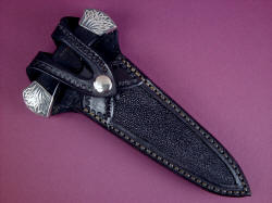 "Grim Reaper" sheathed view. Leather sheath is inlaid with Black Stingray skin, retention is top strap with nickel plated steel snap.