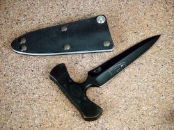 "Grim Reaper" tactical, combat push dagger. Note thick spine, very long and aggressive blade; Primary Edged Weapon